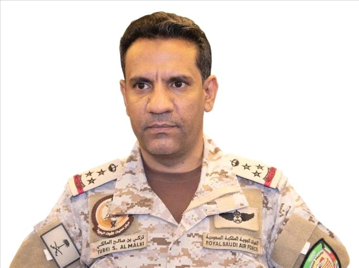 The coalition spokesman denies Houthi allegations of handing over the body of one of its members