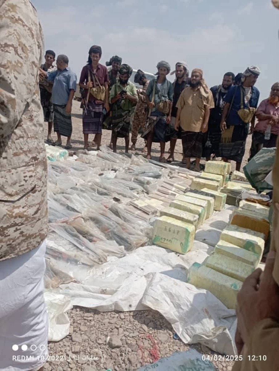 In pictures .. arms shipment was set on a boat on the coast of Ras Al -Ara, Belhaj